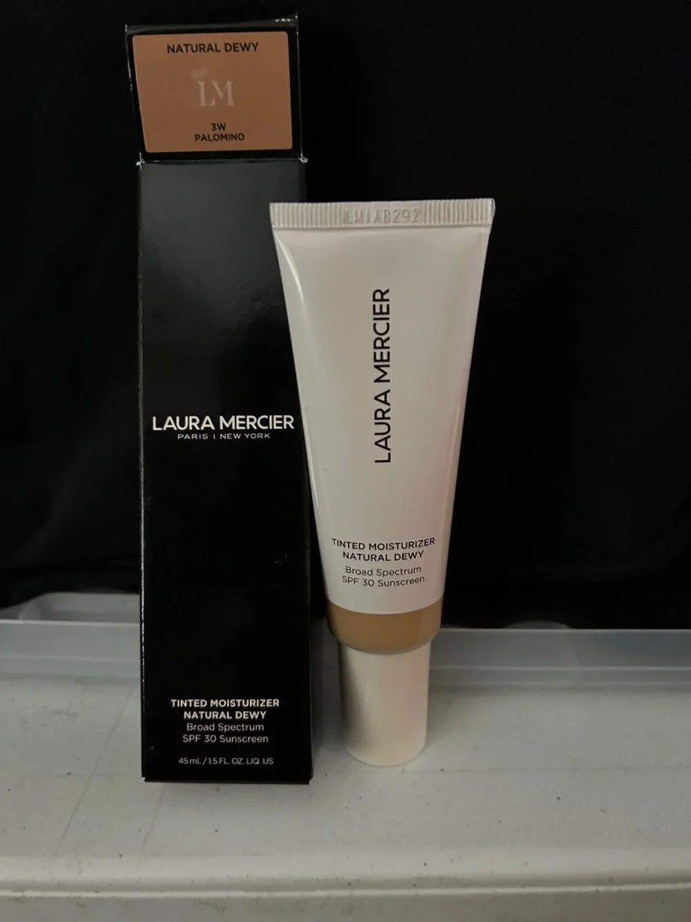 laura mercier Black Packaging Tinted Moisturizer Box