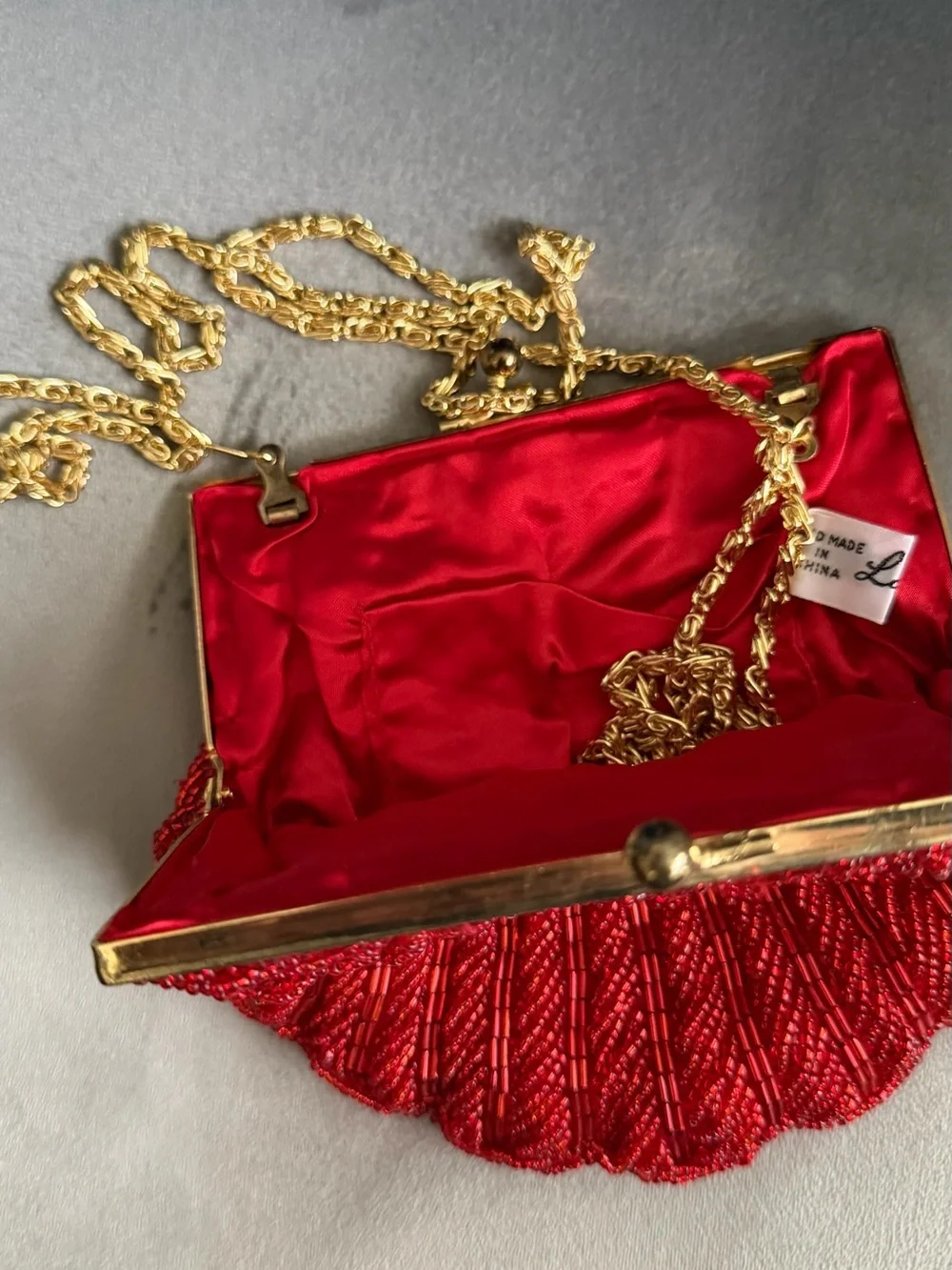 La Regale Red Beaded Shell Clutch