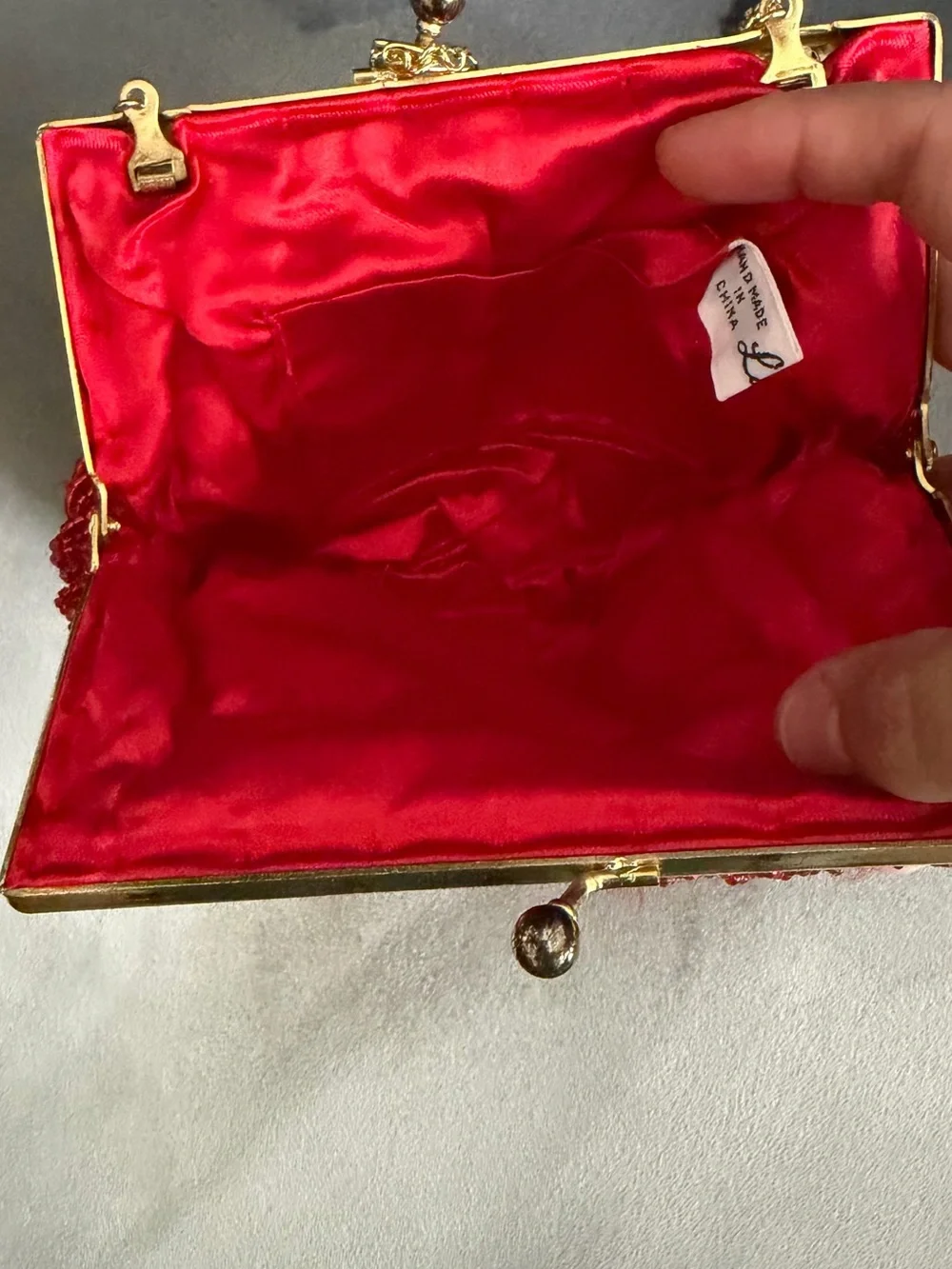 La Regale Red Beaded Shell Clutch